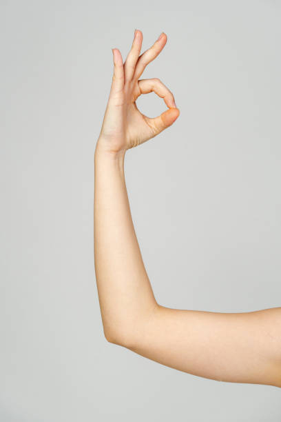 istock Young Woman Arm with Gesture close up 2153065080
