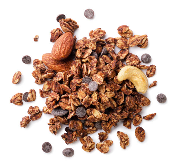 istock Chocolate granola with nuts on a white background. Top view 2153065764