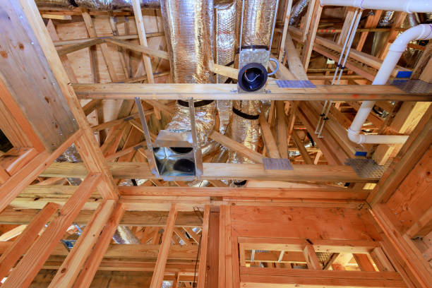istock New home under construction is framing an unfinished wood frame using wood trusses, posts, a beams 2153071878