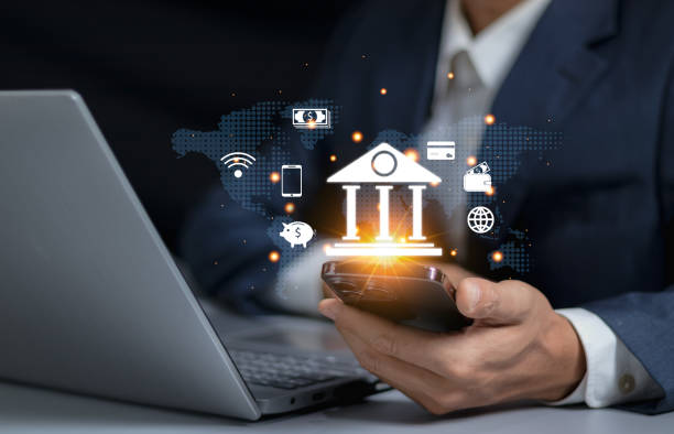 istock Human use smartphone with online banking digital technology, mobile banking, shopping, payment, finance, bank, withdraw money, account, transfer, credit card, financial, global business online 2153081686