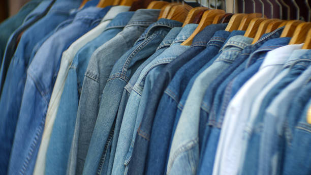 istock Denim jackets lined up in a clothing store 2153082370