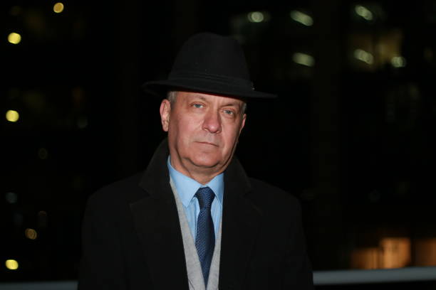 posing mature businessman serious portrait