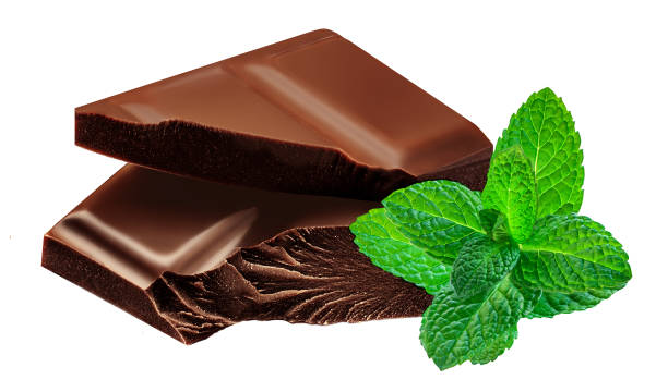 istock Dark Chocolate pieces  isolated. Broken Chocolate with mint leaf on white background as package design elements.  2153086952