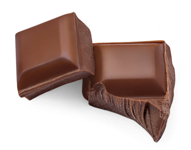 istock Broken milk chocolate pieces isolated. Dark Chocolate pieces on white background as package design elements. Top view. Flat lay 2153087070