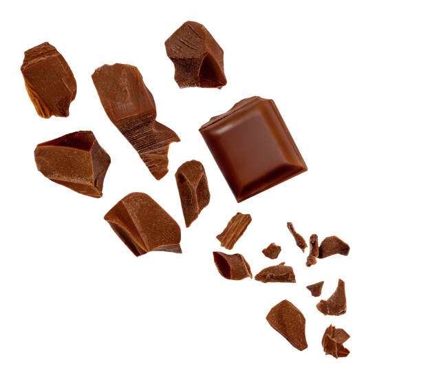 istock Piece of chocolate explosion isolated on white background. Levitating dark  chocolate chunks Collection. Top view. Flat lay. Pattern 2153087141