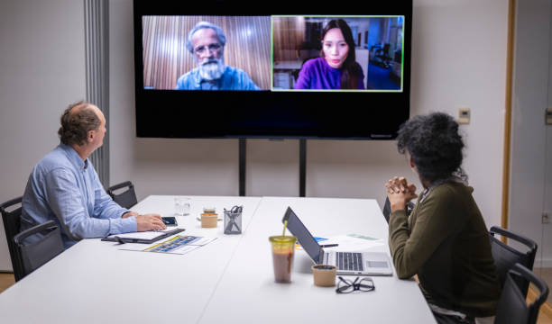 istock Business People Video Conferencing In Board Room 2153088506