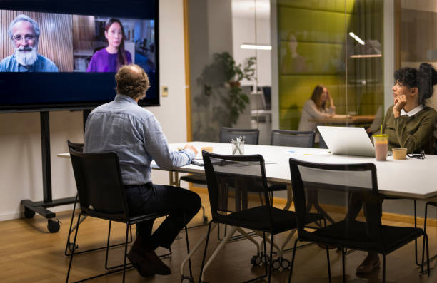 istock Business People Video Conferencing In Board Room 2153088521