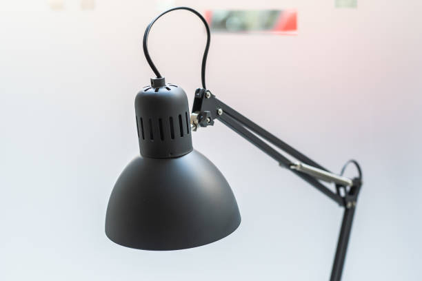 istock Vintage black desk lamp at home 2153089156
