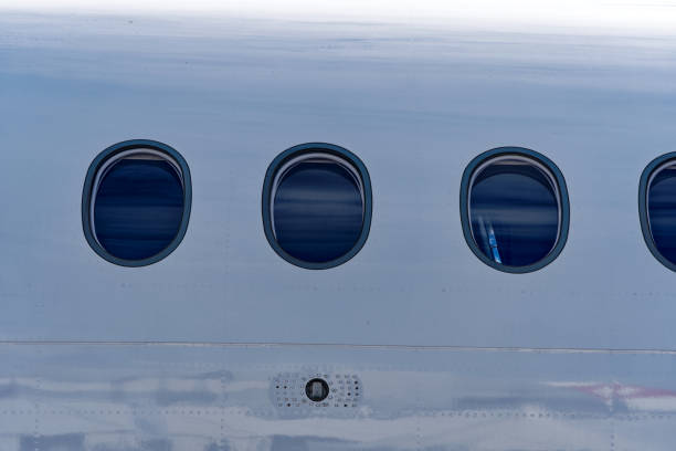 Close-up of window outside of passenger airplane at Swiss Zürich Kloten Airport on a sunny late summer day. Photo taken September 1st, 2023, Kloten, Canton Zürich, Switzerland.