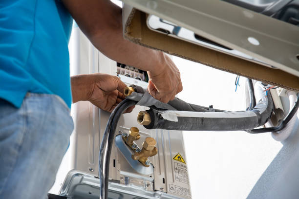 istock Technician  install  air conditioner outdoor unit 2153092958