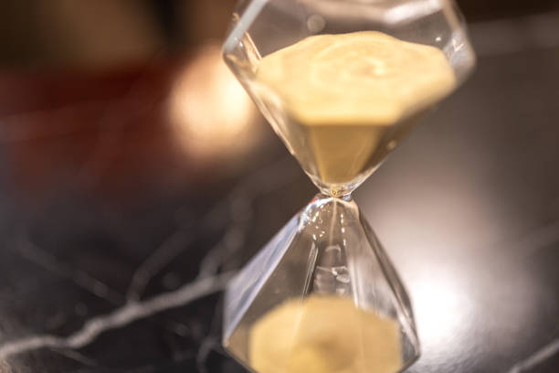 istock A sandglass or hourglass on table. 2153097162