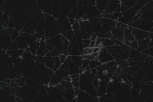 istock The pattern on the glass is cracked.  damage to the glass.  cracked texture 2153099242