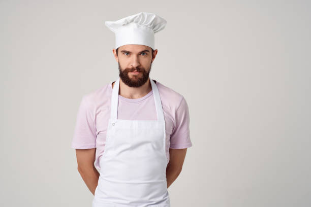 istock cheerful male chef in uniform gestures with his hands gourmet restaurant 2153103148