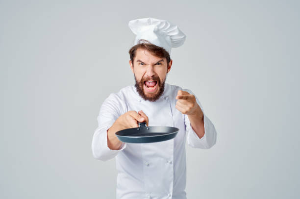 istock male cook pan cooking kitchen culinary industry 2153103358