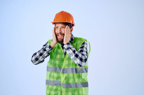 istock emotional man in working uniform construction building profession isolated background 2153107020