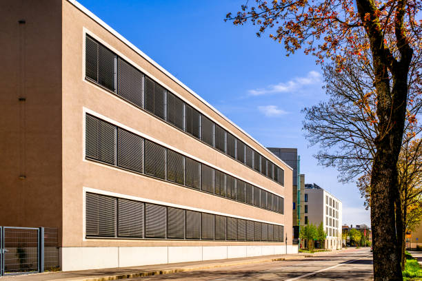 istock typical windows of an office building 2153109750