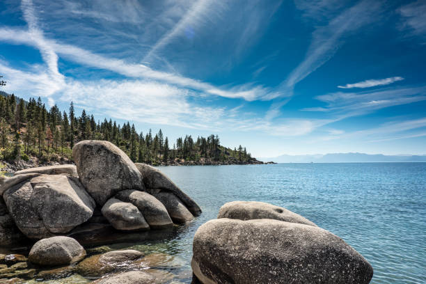 Scenic nature view over Lake Tahoe from the rocky boulders on shore in summer