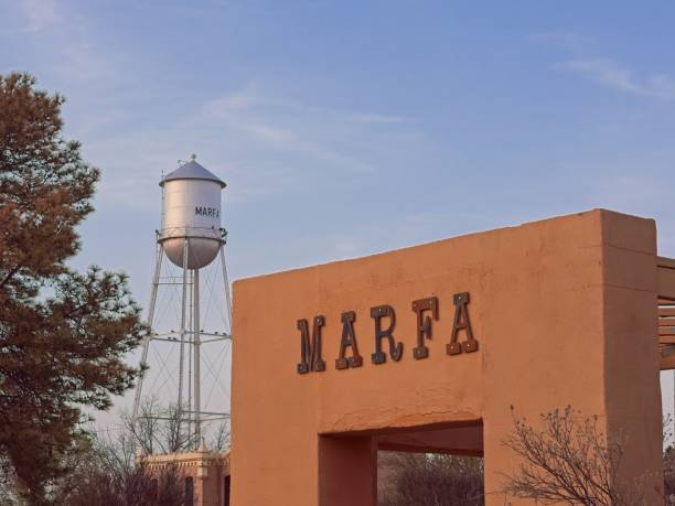 istock Marfa spelled out on government building with water tower standing in background 2153112596