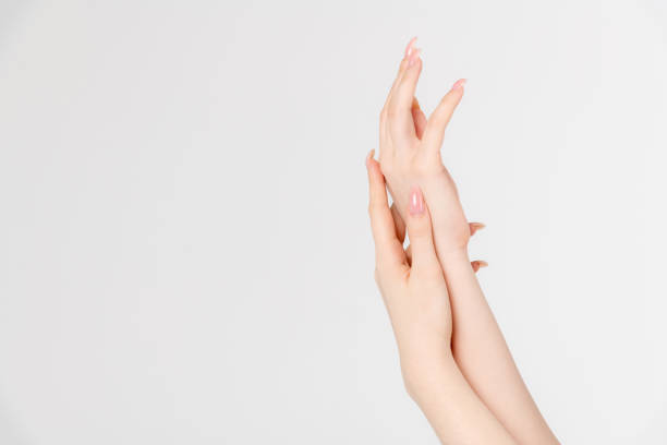 istock Female hands softly touching each other 2153118760
