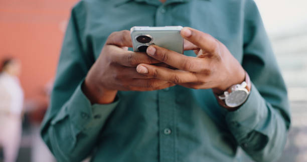 istock Hands, business and man with a smartphone, typing and connection with network, internet and social media. Person, closeup and employee with a cellphone, technology and mobile user with digital app 2153119858