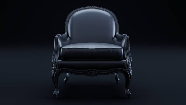 istock black armchair isolated on a dark background 2153120980