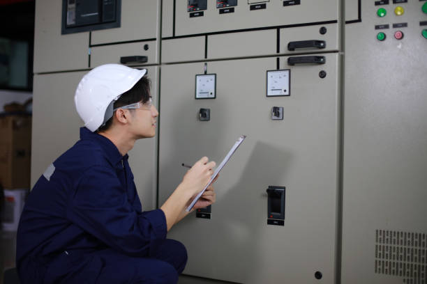 istock The electrical engineer checks and inspects at MDB panel (Main Distribution Board ) in the Substation building, daily and checks the electric switchboard on the Main Distribution Boards of the factory 2153123065