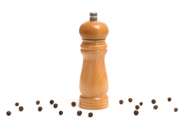 istock Wooden pepper mill isolated on white background. 2153123203