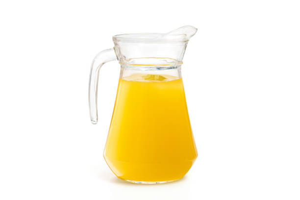 istock Orange juice in a jug. Isolated on white background 2153123214