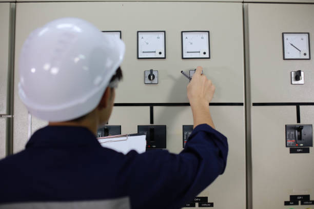 istock The electrical engineer checks and inspects at MDB panel (Main Distribution Board ) in the Substation building, daily and checks the electric switchboard on the Main Distribution Boards of the factory 2153123318