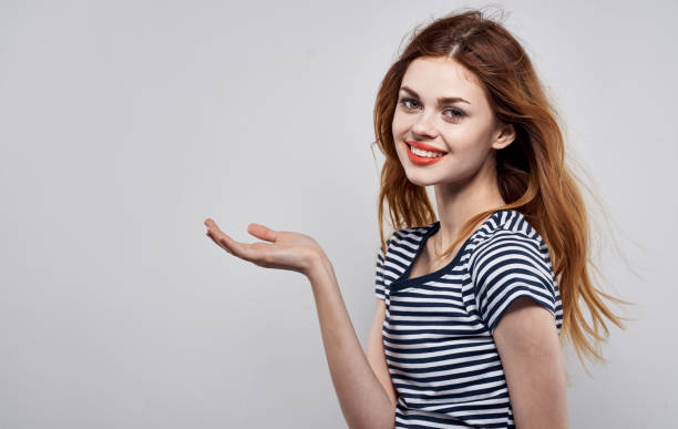 istock emotional woman with bright makeup gesturing with hands on gray background Copy Space 2153126776