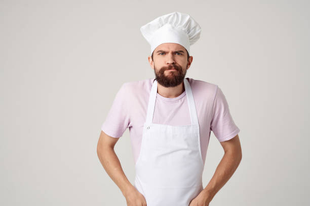 istock bearded male chef in uniform emotions kitchen professional 2153129029