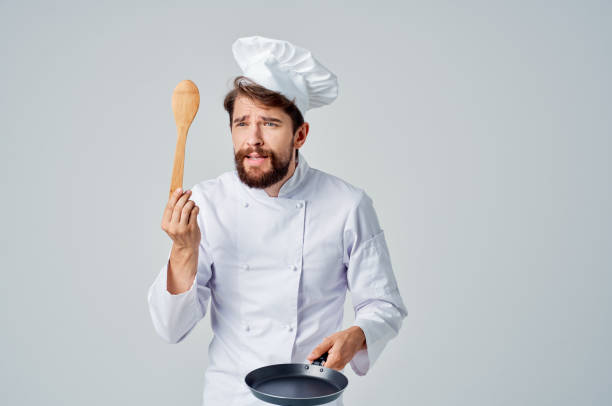 istock male chef kitchenware cooking service job 2153130023