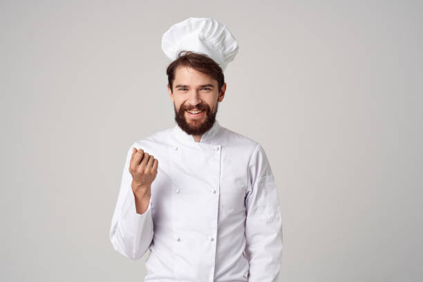 istock male cook Chef uniform Cooking emotions gourmet isolated background 2153132015