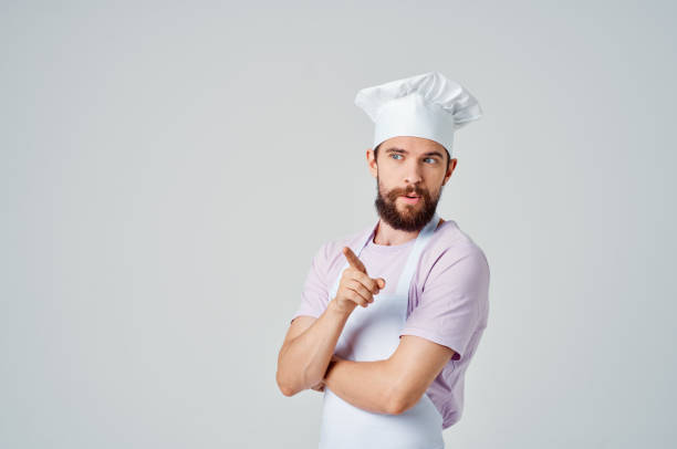 Chef taking orders and preparing food in a fast food restaurant