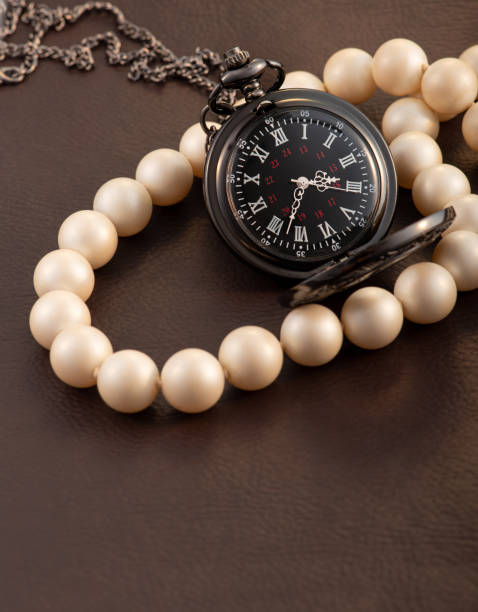 A gold wrist watch.