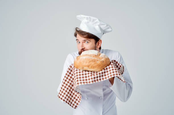 istock Chef with bread in hand Professional emotions 2153134369