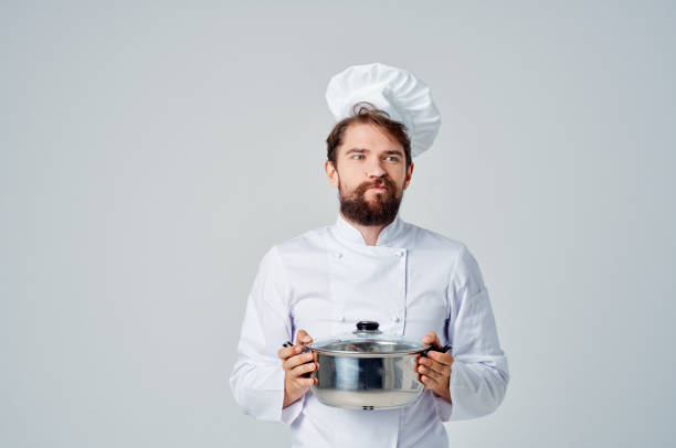 istock professional chef with a saucepan in his hands working in the kitchen 2153135007