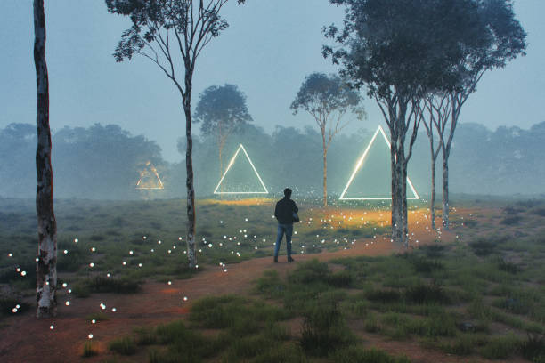 Man walking in mysterious landscape with glowing triangles