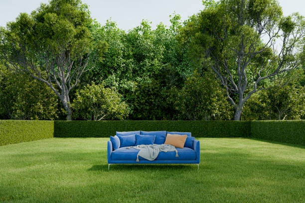 Sofa in the middle of public park meadow. 3D generated image.