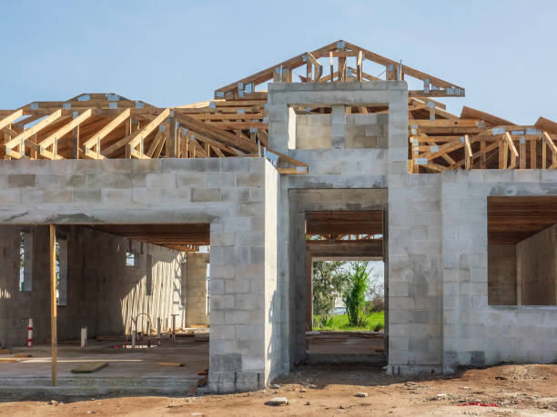 istock Concrete shell of a house under construction 2153140438