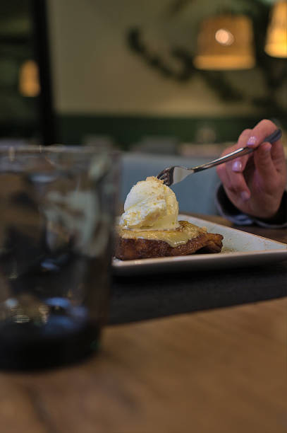 istock Enjoying a Gourmet Dessert in a Cozy Restaurant 2153149802