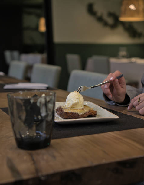 Enjoying a Gourmet Dessert in a Cozy Restaurant