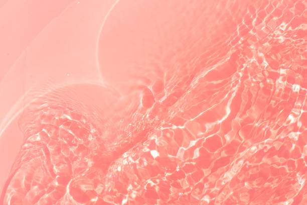 istock Bluewater waves on the surface ripples blurred. Defocus blurred transparent blue colored clear calm water surface texture with splash and bubbles. Water waves with shining pattern texture background. 2153160203