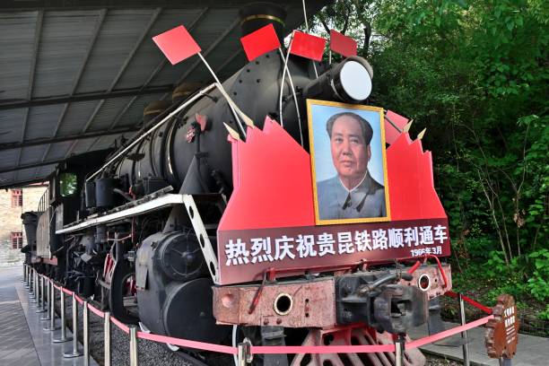 Open air exhibition in Shuicheng Ancient Town, Liupanshui City, Guizhou Province，Before the middle of the last century, railway transportation was extremely inconvenient because of the high mountains. In March 1966, after painstaking efforts, Guizhou Province and Yunnan Province were connected by train, which was the first steam locomotive in the opening ceremony at that time. Now, it is displayed as a historical relic for people to visit.