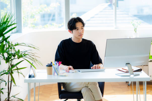 istock business person working in office 2153161881