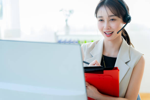 istock Businessman working at a call center 2153162122