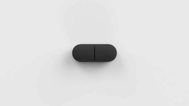 istock Black single pill isolated on a white background. Tablet, pill capsule top view, flat lay. 3d render illustration 2153163481