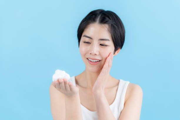 istock woman holding bubbles in her hand 2153163707