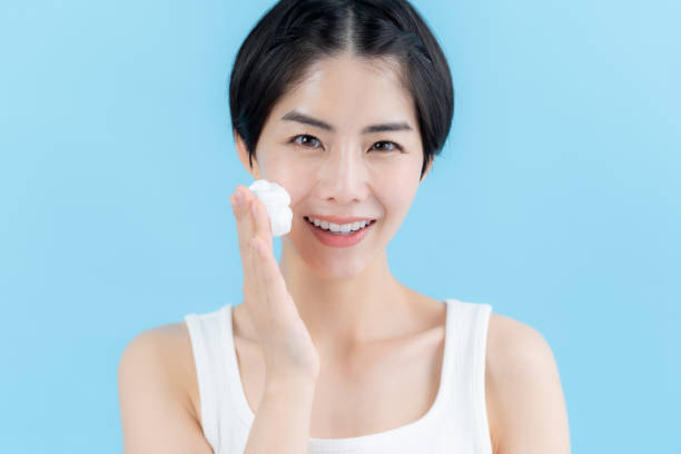 istock woman holding bubbles in her hand 2153163720
