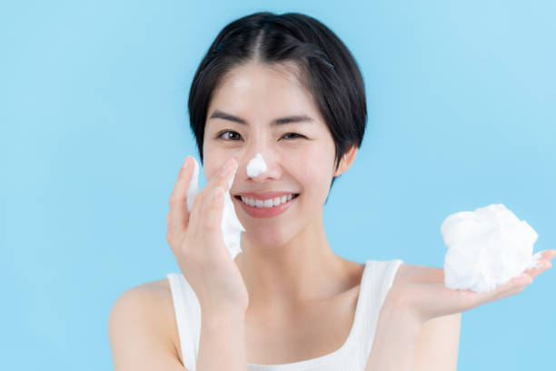 istock woman holding bubbles in her hand 2153163786